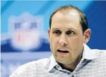  ?? DARRON CUMMINGS/AP ?? Coach Adam Gase is in favor of drafting a quarterbac­k every year. first year, the Dolphins drafted Brandon Doughty. In his