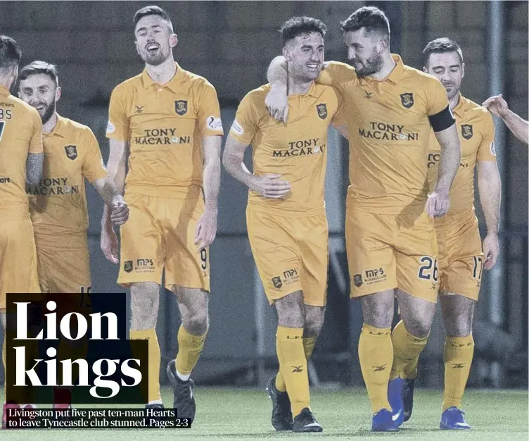  ??  ?? Livingston’s Ryan Hardie (No 9) celebrates his second goal with his team-mates. The West Lothian club thrashed Hearts 5-0, recording their best-ever victory in the top flight and moving up to fifth place.