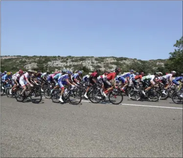  ?? THE ASSOCIATED PRESS ?? The pack rides during the seventeent­h stage of the Tour de France cycling race over 200 kilometers (124,27 miles) with start in Pont Du Gard and finish in Gap, France, Wednesday, July 24, 2019.