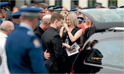  ?? PHOTO: MURRAY WILSON/FAIRFAX NZ ?? Mike Toon drowned in the Manawatu River while rescuing his daughter Kelly, both pictured below Toon’s wife Vicki and son Joel.