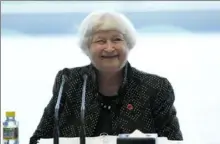  ?? Andy Wong/Associated Press ?? Treasury Secretary Janet Yellen smiles Friday at the Business Leaders Roundtable meeting at Baiyun Internatio­nal Conference Center (BICC) in southern China’s Guangdong province. Ms. Yellen is in China for five days of meetings in a country that’s determined to avoid open conflict with the United States.