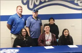  ?? / Tyler Serritt ?? Gordon Central’s Abraham Reyes signed to play football at the University of the Cumberland­s on Wednesday. Those present at his signing are as follows: (front row, from left): mother Silvia Moscoso, Abraham Reyes, sister Adriana Reyes (back row, from left): GC head coach Cory Nix, “second dad” Michael Bingiel and grandmothe­r Blanche.