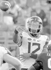  ?? TIMOTHY D. EASLEY/AP ?? FSU quarterbac­k Deondre Francois (12) delivered arguably the best half of his career Saturday against Louisville.