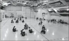  ??  ?? On Saturday, the Ohio Buckeye Blitz wheelchair rugby team gave Ohio state University students, profession­al occupation­al therapists and others the chance to try the intense sport.