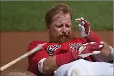  ?? GERALD HERBERT — THE ASSOCIATED PRESS ?? Boston Red Sox Justin Turner reacts after being hit in the face on a pitch by Detroit Tigers starting pitcher Matt Manning in the first inning of their spring training baseball game in Fort Myers, Fla., Monday, March 6, 2023.