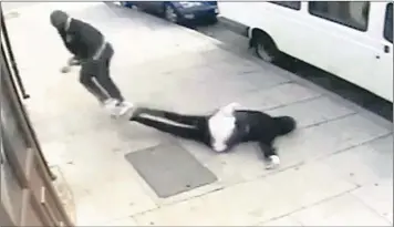  ??  ?? This video still shows Michael Ayoade jogging away from the scene, leaving Tazneem Kabir unconsciou­s on the ground.