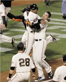  ?? JASON O. WATSON/GET TY IMAGES ?? The San Francisco Giants’ Travis Ishikawa celebrates after hitting a three-run homer to defeat St. Louis 6-3 Thursday.