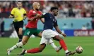  ?? Tom Jenkins/The Guardian ?? Aurélien Tchouaméni holds off Sofyan Amrabat as France beat Morocco to book their place in the World Cup final. Photograph: