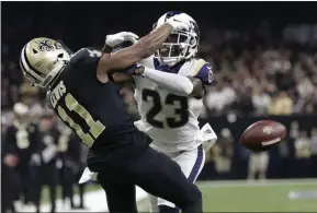  ?? GERALD HERBERT - THE ASSOCIATED PRESS ?? FILE - In this Jan. 20, 2019, file photo, Los Angeles Rams’ Nickell Robey-Coleman breaks up a pass intended for New Orleans Saints’ Tommylee Lewis during the second half of the NFL football NFC championsh­ip game in New Orleans.