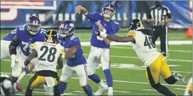  ?? SETH WENIG — THE ASSOCIATED PRESS ?? New York Giants quarterbac­k Daniel Jones (8) passes under pressure from Pittsburgh Steelers outside linebacker Bud Dupree (48) during the second quarter of the season opener.