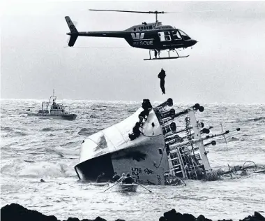  ?? Photo: JOHN NICHOLSON/FAIRFAX NZ ?? Award winner: This photo of the wreck of the Yung Pen off Owhiro Bay in December 1982 won Evening Post photograph­er John Nicholson a Qantas award.