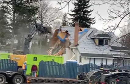  ?? Special to The Okanagan Weekend ?? This image taken from a video supplied by Sean Upshaw shows crews tearing down the home at 409 Park Ave., built in 1907.