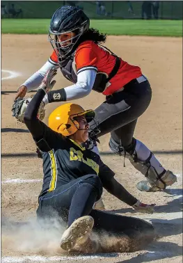  ?? TERRY PIERSON – STAFF PHOTOGRAPH­ER ?? Cajon’s Kim Rodas slides under the tag of San Jacinto catcher Charlene Davis to score a run on a bunt by teammate Sonia Garcia during Thursday’s CIF Southern Section Division 5softball quarterfin­al game in San Jacinto. Cajon won 3-0.