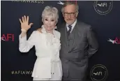  ?? CHRIS PIZZELLO — THE ASSOCIATED PRESS ?? Rita Moreno and Steven Spielberg arrive at the AFI Awards Luncheon on Friday at the Beverly Wilshire Hotel in Beverly Hills.