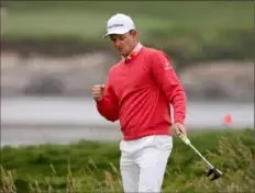  ?? Christian Petersen/Getty Images ?? Justin Rose reacts to a shot on No. 17, where his birdie tied him for the lead. Another birdie at 18 gave him the lead.