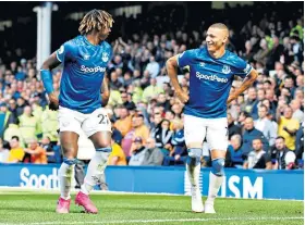  ??  ?? Dancing partners: Richarliso­n (right) celebrates his first goal with Moise Kean