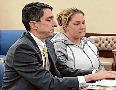  ?? Robert Gavin/times Union ?? Caitlin Mullaney, 36, of Slingerlan­ds, sits beside her attorney, Justin dearmas, at her sentencing in Albany County Court on Monday.