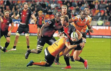  ?? Picture: GALLO IMAGES ?? HELD UP: Southern Kings’ Rudi van Rooyen is heavily tackled during the Super Rugby match against the Cheetahs at the Nelson Mandela Bay Stadium in Port Elizabeth on Friday. The Cheetahs won a tight match 21-20