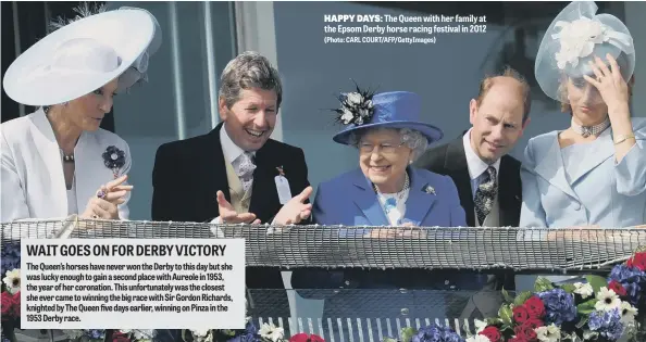  ?? (Photo: CARL COURT/AFP/GettyImage­s) ?? Happy Days: The Queen with her family at the Epsom Derby horse racing festival in 2012