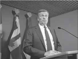  ?? CP PHOTO ?? Toronto Mayor John Tory speaks to media during a news conference following a court decision to block Ontario Premier Doug Ford’s plan to cut Toronto Council seats nearly in half, at Toronto City Hall on Monday.