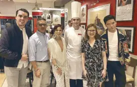  ??  ?? (From left) Javi Martinez, Dennis and Tessa Valdes, chef Clement Damotte and La Mère Poulard’s Deb Tan with Tim Yap.