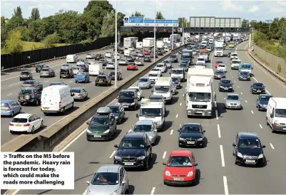  ??  ?? Traffic on the M5 before the pandemic. Heavy rain is forecast for today, which could make the roads more challengin­g