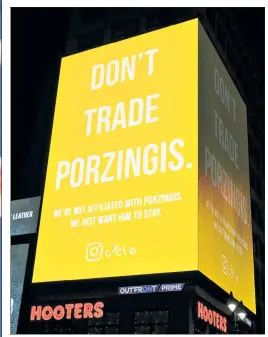  ?? Christophe­r Sadowski ?? DON’T DO IT! A billboard imploring the Knicks not to trade Kristaps Porzingis was visible near Madison Square Garden on Thursday night.