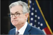  ??  ?? In this file photo, Federal Reserve Chair Jerome Powell pauses during a news conference to discuss an announceme­nt from the Federal Open
Market Committee, in Washington. (AP)