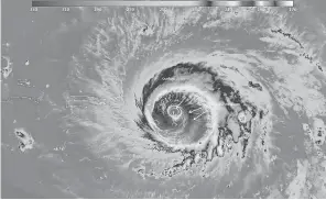  ?? WILLIAM STRAKA III, NASA/NOAA/UWM-CIMSS ?? Hurricane Irma passes over the island of Barbuda on Wednesday.