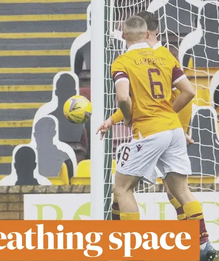  ??  ?? 2 Mohamed Elyounouss­i’s stunning header delivers the clinching third goal for Celtic in their 4-1 victory at Motherwell. Inset left: Shane Duffy