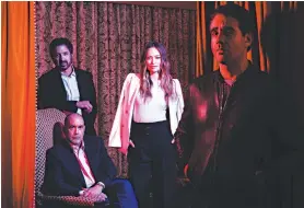  ?? BRINSON+BANKS FOR THE NEW YORK TIMES ?? Terence Winter, seated, with the stars of “Vinyl,” from left: Ray Romano, Olivia Wilde and Bobby Cannavale.