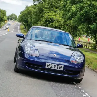  ??  ?? Ocean Blue looks good on a 996 and makes a change from the silver of most early cars. James’s Carrera 2 is a 1999 model