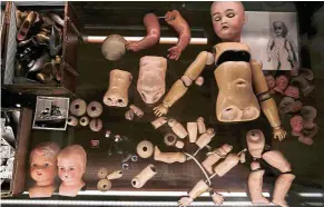  ?? — Reuters ?? Old doll parts are on display at the Benaki Toy Museum in Athens.