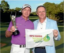  ?? GETTY IMAGES ?? John Key with Brett Rumford, the winner of the ISPS HANDA World Super 6 Perth.