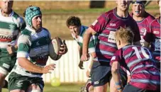  ?? Photo: Nev Madsen ?? BIG RUN: Condamine Cods player Roger Geldard takes the ball to the line against Toowoomba Bears.