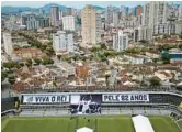  ?? MATIAS DELACROIX/AP ?? Banners with “Long live King Pele, 82 years” in Portuguese are displayed in the stands of the Vila Belmiro stadium, home of the Santos soccer club, where Pele’s funeral will take place, in Santos, Brazil.