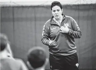  ?? Staff file photo ?? Haley Carter, who is from Friendswoo­d and is a coach for the Afghanista­n women’s national soccer team, helps the players with their problems off the field as well as in their personal lives.