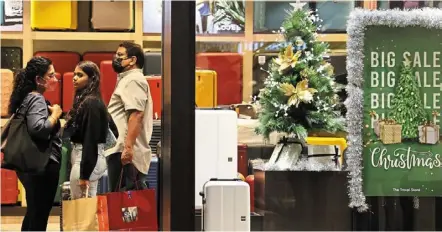  ?? — azman Ghani/the Star ?? Shop till you drop: Shoppers looking for a good bargain this holiday season are making a beeline for malls like the mid valley megamall in Kuala Lumpur.