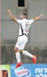  ?? (Adi Avishai) ?? MACCABI PETAH TIKVA midfielder Giddy Kanyuk celebrates after scoring the first of his two goals in last night’s 2-0 win over Hapoel Tel Aviv.