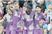  ?? REUTERS ?? Tottenham’s goalscorer­s, from right, Son Heung-Min, Tanguy Ndombele and Harry Kane.