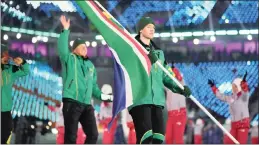  ?? PICTURE: ROB SCHUMACHER-USA TODAY SPORTS/AFRICAN NEWS AGENCY (ANA) ?? Connor Wilson of South Africa carries the national flag.