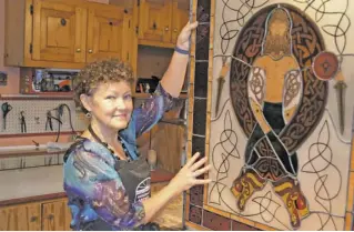  ?? BY BOB HURLEY (ABOVE); PATRICIA BRENNAN (RIGHT) ?? Patti Brennan’s stained-glass pieces, including “St. Patrick,” are created with a level of detail and intricacy that sets them apart from more traditiona­l works.