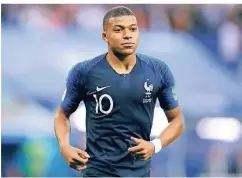  ?? FOTO: AP/DAVID VINCENT ?? Erfolgreic­h im Nike-Outfit: Der Franzose Kylian Mbappe hat sich auf der WM-Bühne zum Star entwickelt.