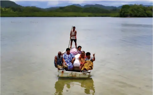  ??  ?? ABOVE / The most precious cargo, bras, are ferried across the channel to Serua Island. More ‘seasoned’ Uplift Project veterans form the top of the hierarchy when it comes to nabbing a ride with the bras on the ferry. I walked.