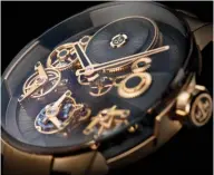  ??  ?? Ulysse Nardin explored novel finishings such as shimmery carbonium gold (above left) and textured straw marquetry (above right) for the dial of the Executive Tourbillon Free Wheel