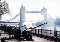  ?? Reuters ?? Members of the Honorable Artillery Company fire a 62-gun salute across the River Thames to mark the 92nd birthday of Queen Elizabeth at the Tower of London on Saturday.