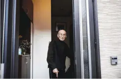  ??  ?? OSAKA: Japanese Kuniyoshi Takimoto, who was a Japan Navy aircraft mechanic during Pearl Harbor attack on December 7, 1941, looks on at the doorway of his home in Osaka. — AFP