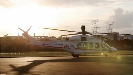 ??  ?? An Italy-made AW189 helicopter, an exhibit for the first China Internatio­nal Import Expo, arrives in Shanghai on October 20