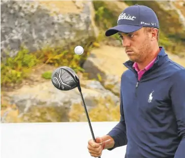  ?? THE ASSOCIATED PRESS ?? Justin Thomas bounces a ball on his driver on the 12th hole during the final round of the CJ Cup on Sunday at Nine Bridges on Jeju Island, South Korea.