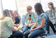  ?? OKLAHOMAN] ?? A group practices working with families that will come for services at the new Centurion Center, a veterans center opening in November in Del City. [DOUG HOKE/ THE